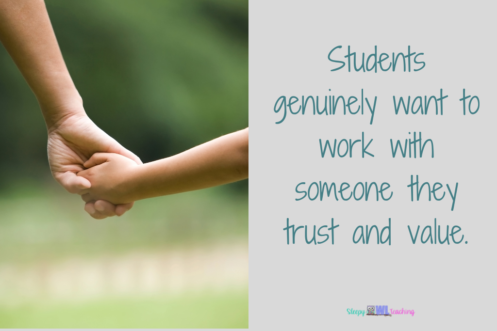 photo of an adult hand holding a child's hand and the text "Students genuinely want to work with someone they trust and value."